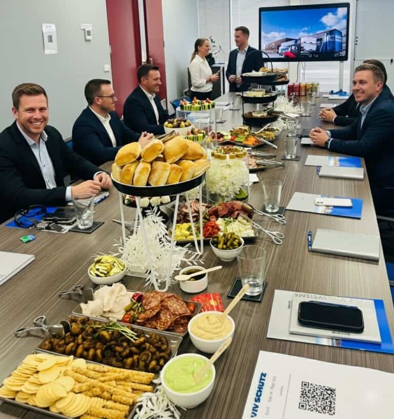 Freshly prepared gourmet catering with artisanal sandwiches and a variety of premium appetizers for corporate events.